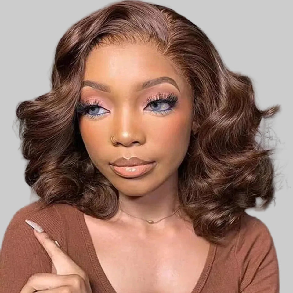 Woman with styled hair and makeup in a neutral setting