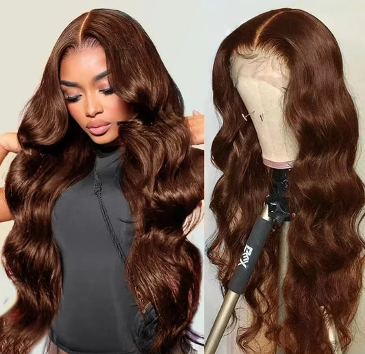 Woman with long brown hair and a mannequin head with wavy hair on a white background